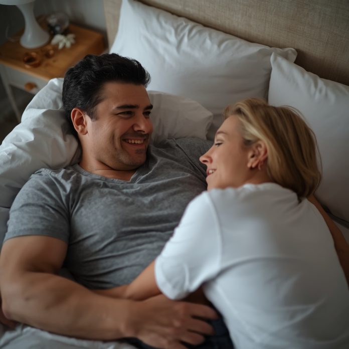 lucid-origin_Image_is_a_candid_intimate_photograph_featuring_a_middle-aged_couple_lying_on_a_-0